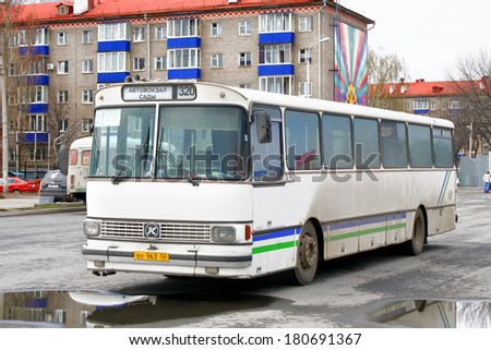 UFA, RUSSIA - APRIL 24, 2010: White Setra S140ES city bus at the city street.