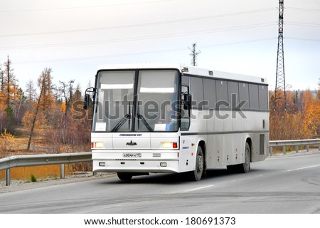 NOVYY URENGOY, RUSSIA - SEPTEMBER 28, 2012: White MAZ 152 Vazola interurban coach at the city street.