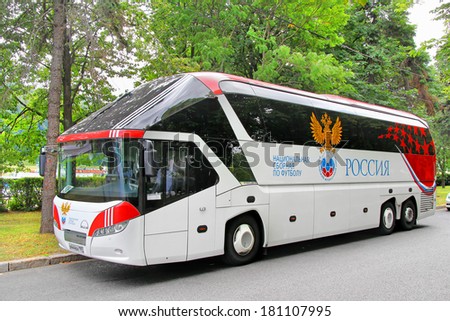 MOSCOW, RUSSIA - JULY 7, 2012: White Neoplan N5217/3SHD Starliner coach of the Russia Football team at the city street.