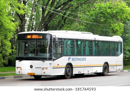 MOSCOW, RUSSIA - JUNE 2, 2012: White Mercedes-Benz O345 Conecto H suburban bus at the city street.