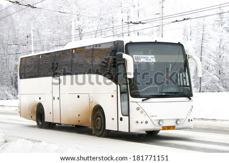 UFA, RUSSIA - JANUARY 13, 2010: White VDL Mistral interurban coach at the city street.