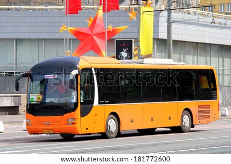 MOSCOW, RUSSIA - MAY 6, 2012: Orange MAN R12 Lion\'s Regio suburban bus at the city street.