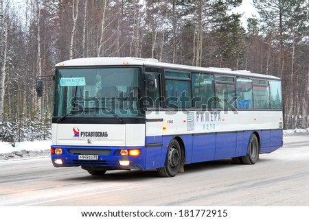 NOYABRSK, RUSSIA - OCTOBER 27, 2012: Blue Karosa C954E suburban bus at the city street.