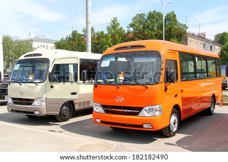 UFA, RUSSIA - MAY 23, 2012: Two Hyundai County small city buses at the city street.