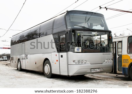 UFA, RUSSIA - MARCH 10, 2008: Silver Neoplan N1116 Cityliner interurban coach at the city street.