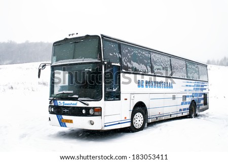 ASHA, RUSSIA - JANUARY 3, 2009: White Van Hool T815 Acron interurban coach at the snow field.