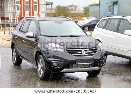 NOVYY URENGOY, RUSSIA - SEPTEMBER 1, 2013: French motor car Renault Koleos exhibited at the annual open air motor show Autosalon.