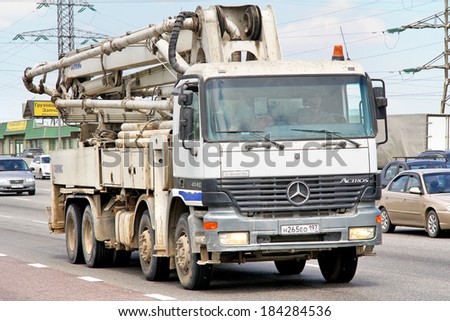 MOSCOW, RUSSIA - JUNE 2, 2012: White Mercedes-Benz Actros 4140 concrete pump truck at the city street.