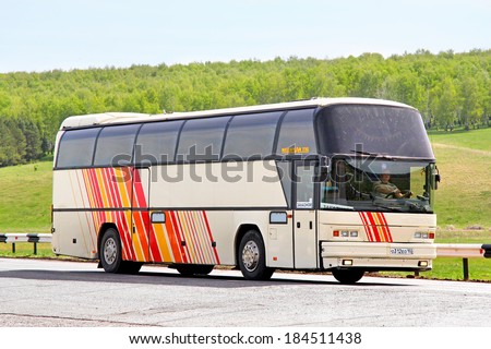 BASHKORTOSTAN, RUSSIA - MAY 20, 2013: Neoplan N116 Cityliner interurban coach at the interurban road.