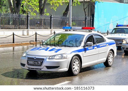 MOSCOW, RUSSIA - MAY 6, 2012: Russian police car Volga Siber at the city street.
