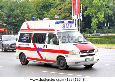 BERLIN, GERMANY - SEPTEMBER 10, 2013: Volkswagen Transporter ambulance car at the city street.