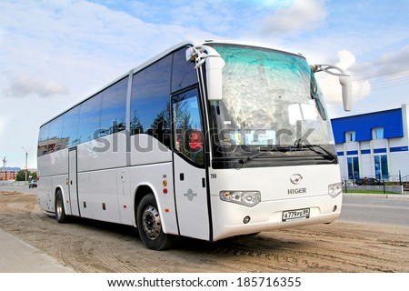 NOVYY URENGOY, RUSSIA - AUGUST 26, 2012: White Higer KLQ6129Q interurban coach at the city street.