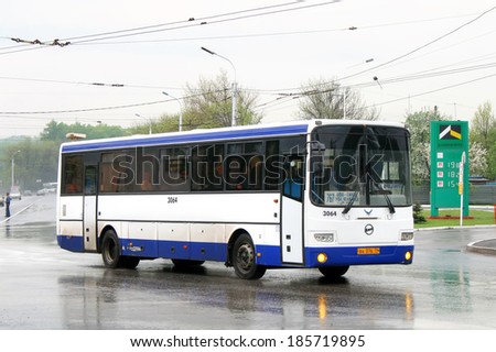 UFA, RUSSIA - MAY 15, 2009: White and blue GOLAZ-LIAZ 5256 interurban coach at the city street.