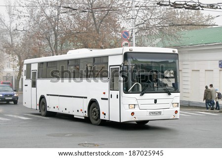 UFA, RUSSIA - OCTOBER 10, 2010: White NEFAZ 5299 interurban coach at the city street.