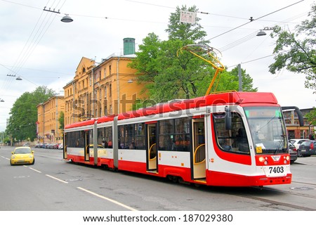 SAINT PETERSBURG, RUSSIA - MAY 26, 2013: Modern russian tramway 71-631-02 takes part at the Retro Urban Transport Parade.