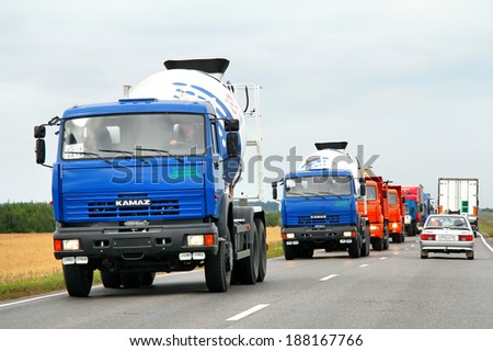 TATARSTAN, RUSSIA - AUGUST 20, 2011: Brand new KAMAZ construction trucks at the interurban road.