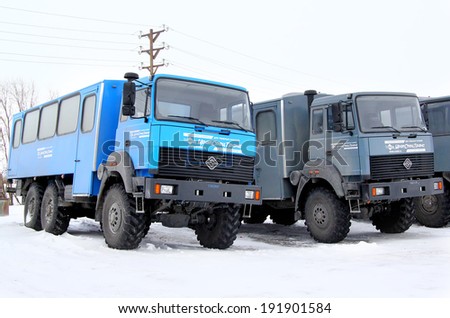 NOVYY URENGOY, RUSSIA - APRIL 26, 2014: Ural 3255 off-road buses at the city street.