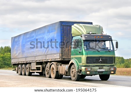 BASHKORTOSTAN, RUSSIA - SEPTEMBER 5, 2009: Green Mercedes-Benz SK semi-trailer truck at the interurban road.
