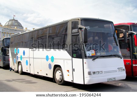 SAINT PETERSBURG, RUSSIA - MAY 25, 2013: White Droegmoeller E330H EuroComet interurban coach at the city street,