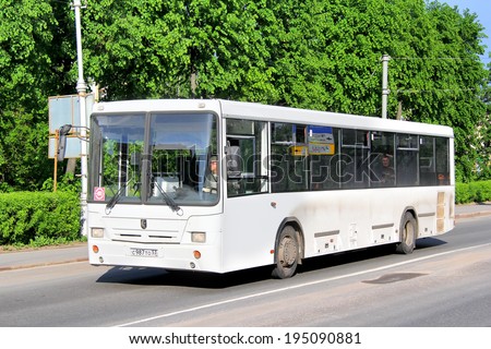 VELIKIY NOVGOROD, RUSSIA - MAY 23, 2013: White NEFAZ 5299 city bus at the city street.