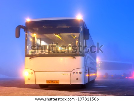 UFA, RUSSIA - JANUARY 28, 2010: White VDL NEFAZ 52996 interurban coach at the bus station during a heavy fog.