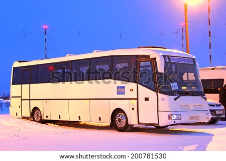NOVYY URENGOY, RUSSIA - FEBRUARY 16, 2013: White SOR LH10.5 Arktika interurban coach at the city street.