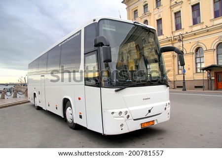 SAINT PETERSBURG, RUSSIA - MAY 26, 2013: White Volvo 9900 interurban coach at the city street.