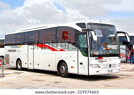 VENICE, ITALY - JULY 30, 2014: White interurban coach Mercedes-Benz O350-15RHD Tourismo at the touristic bus station.
