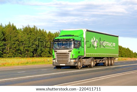 TATARSTAN, RUSSIA - JULY 19, 2014: Green truck Scania G400 at the interurban road,