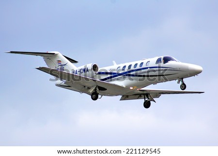BERLIN, GERMANY - AUGUST 17, 2014: WinAir Cessna 525A Citation arrives at the Tegel International Airport.