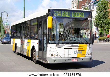 BRUSSELS, BELGIUM - AUGUST 9, 2014: White city bus VDL Jonckheere Transit at the city street.