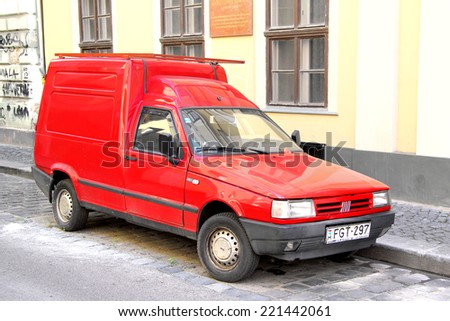 BUDAPEST, HUNGARY - JULY 25, 2014: Red light truck Fiat Fiorino at the city street.