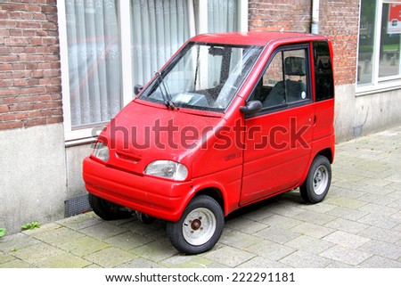 AMSTERDAM, NETHERLANDS - AUGUST 10, 2014: Tiny car Canta LX at the city street.