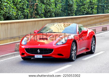 MONTE CARLO, MONACO - AUGUST 2, 2014: Red sports car Ferrari California at the city street.