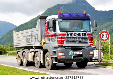 TYROL, AUSTRIA - JULY 29, 2014: German dump truck MAN TGA at the Grossglockner High Alpine Road.