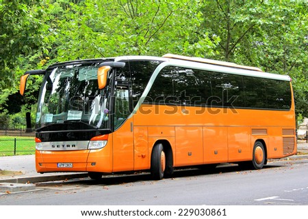 PARIS, FRANCE - AUGUST 8, 2014: Touristic coach Setra S415HD at the city street.