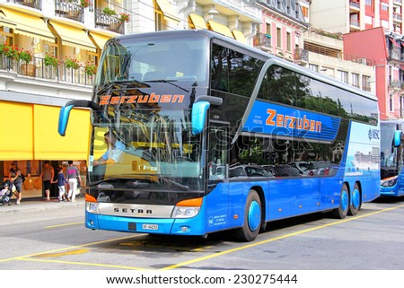MONTREUX, SWITZERLAND - AUGUST 6, 2014: Modern touristic coach Setra S431DT at the city street.