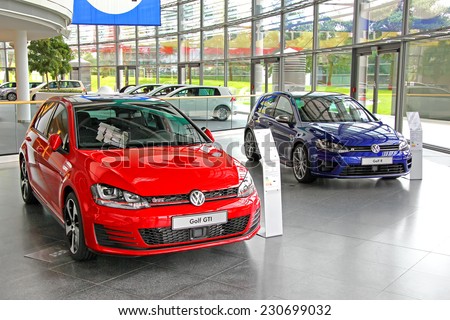 WOLFSBURG, GERMANY - AUGUST 14, 2014: Modern compact cars Volkswagen Golf in the trade center of the Volkswagen Autostadt.