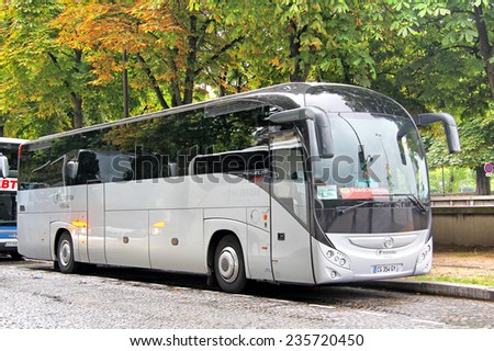 PARIS, FRANCE - AUGUST 8, 2014: Touristic coach Irisbus Magelys Pro at the city street.
