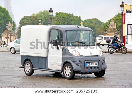 PARIS, FRANCE - AUGUST 8, 2014: Electric cargo truck Aixam Mega at the city street.