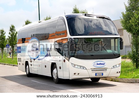 VENICE, ITALY - JULY 30, 2014: Touristic coach Neoplan N1216HD Cityliner at the city street.