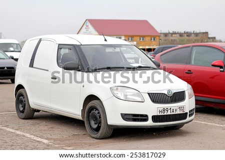 UFA, RUSSIA - APRIL 19, 2012: White cargo van Skoda Praktik in the used cars trade center.