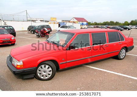 UFA, RUSSIA - APRIL 19, 2012: Red limousine Volvo 940 in the used cars trade center.