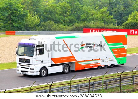 BUDAPEST, HUNGARY - JULY 27, 2014: White semi-trailer truck MAN TGA of the Sahara Force India F1 racing team at the Hungaroring Formula One Race Track.