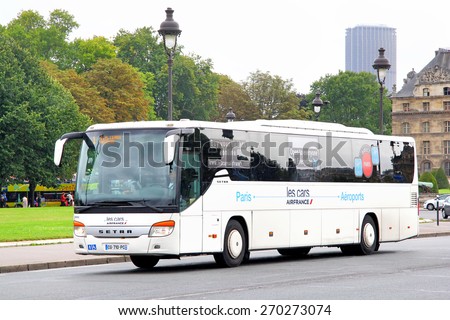 PARIS, FRANCE - AUGUST 8, 2014: White interurban coach Setra S416GT at the city street.