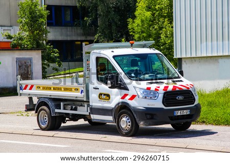 ANNECY, FRANCE - AUGUST 4, 2014: White cargo truck Ford Transit at the city street.