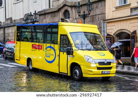 PRAGUE, CZECH REPUBLIC - JULY 21, 2014: Small sightseeing bus Mave (Iveco Daily) at the city street.