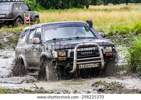 ASHA, RUSSIA - JULY 18, 2015: Off-road vehicle Toyota Surf at the dirt road.