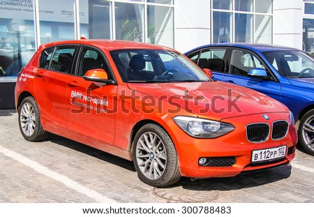 UFA, RUSSIA - AUGUST 31, 2013: Modern compact car BMW F20 1-series at the BMW trade center.