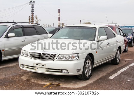 UFA, RUSSIA - APRIL 19, 2012: Motor car Nissan Laurel at the used cars trade center.